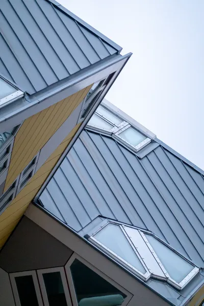 Modern architecture, we see parts of the tilted cubes that constitute houses