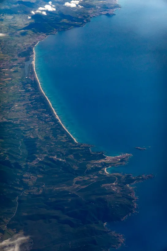 Aerial view of a coast and a long beach