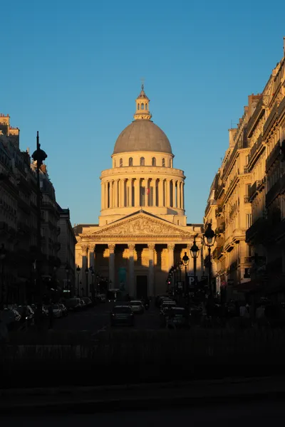 The Pantheon bathed in the light of the setting sun, the street and cars in front can barely be seen
