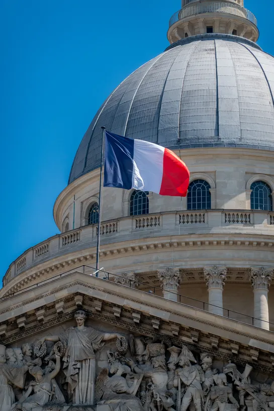The French flag floats above the pediment of the Pantheon