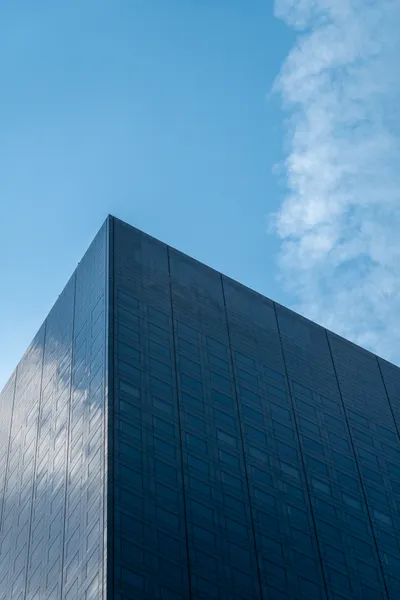 The top of a modern skyscraper